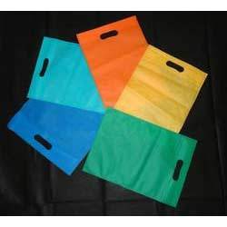 Manufacturers Exporters and Wholesale Suppliers of Woven Colored Bag Rajkot Gujarat